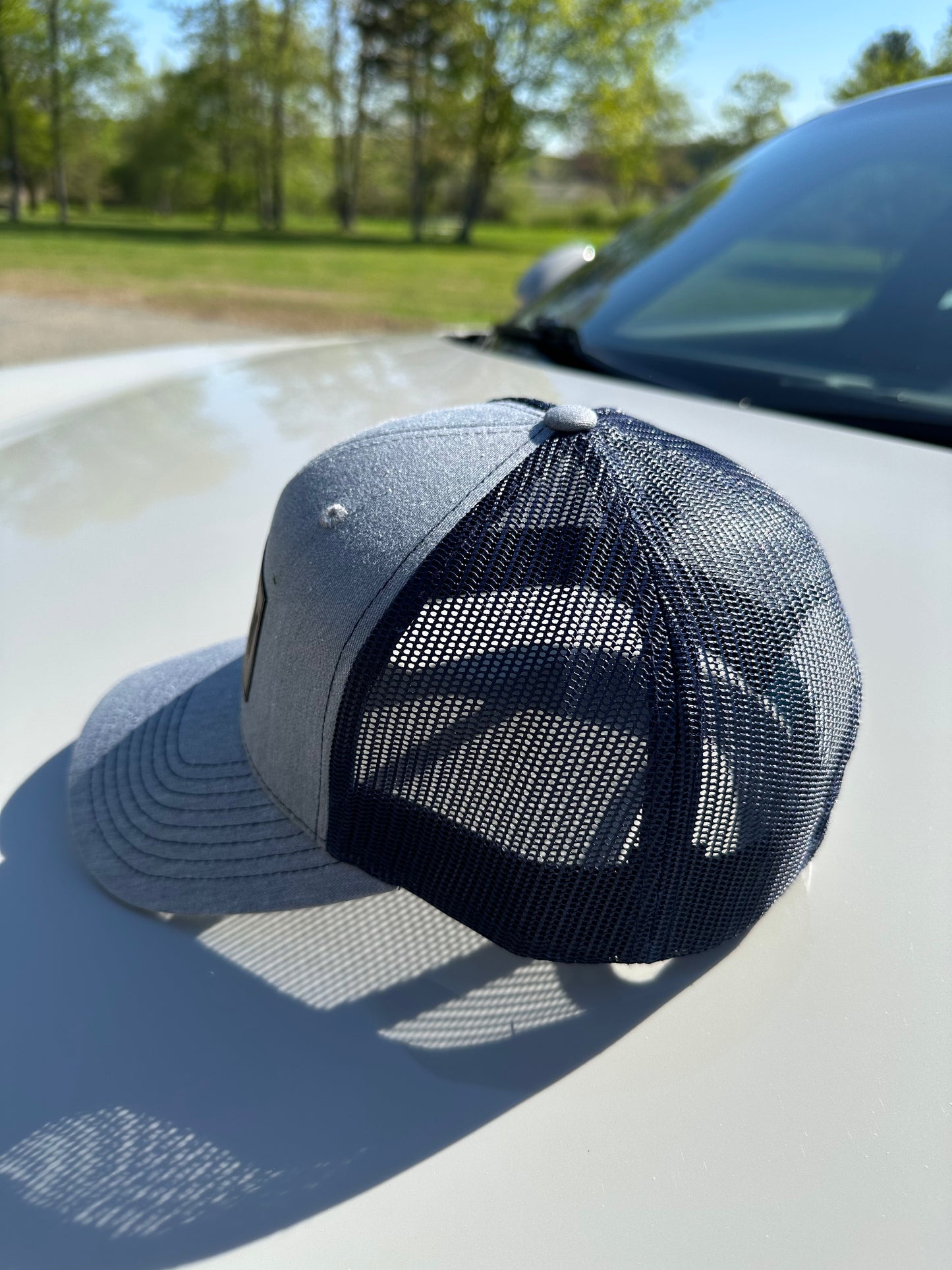 RENNEN Trucker Hat